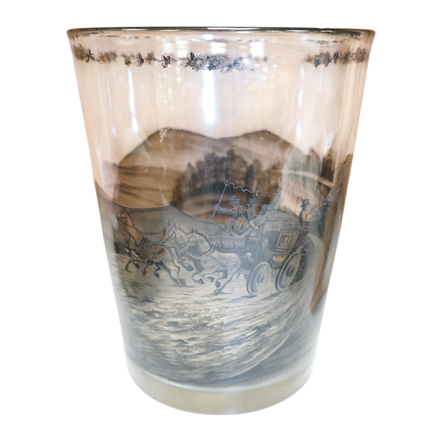 A large German Schwarzlot glass beaker vase, decorated with a painted agricultural scene, 27.5cm high. Condition - fair to good, one chip to the rim and scratches to the base